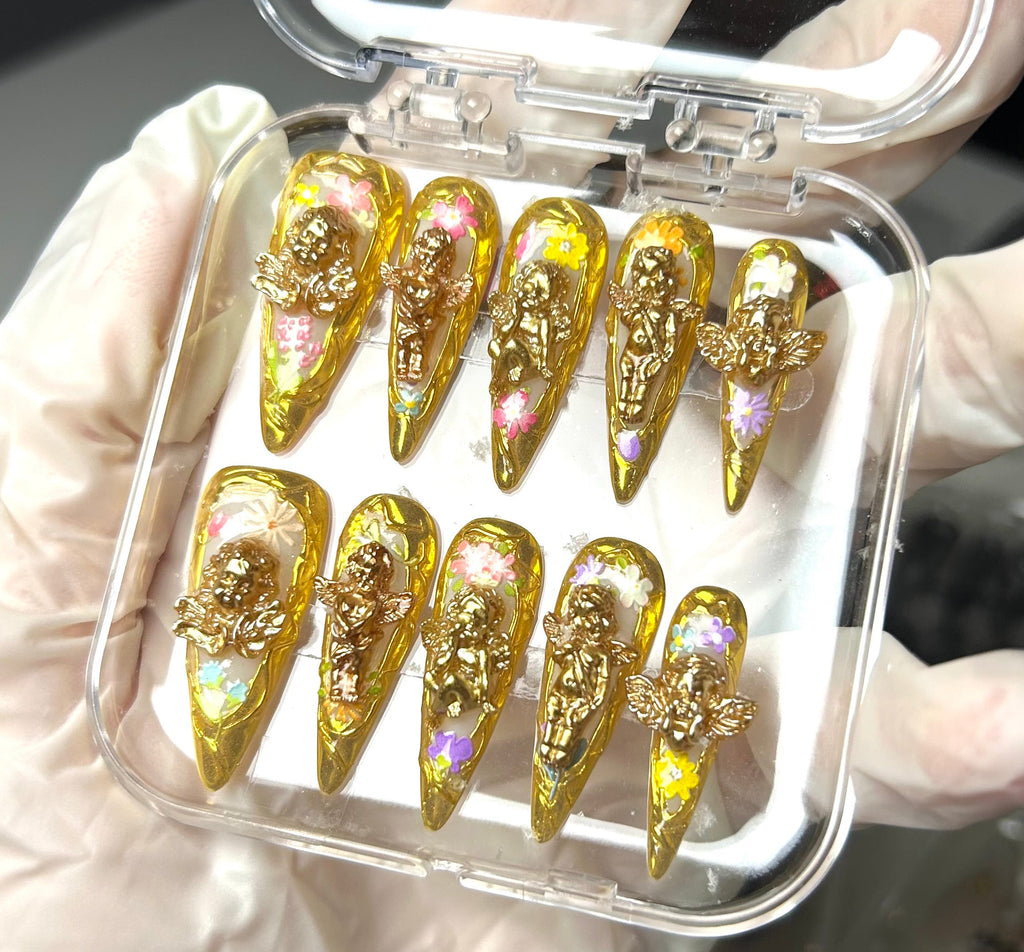 Heavenly Gold Angel Nails